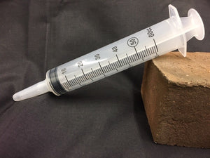 One 2 Ounce Syringe